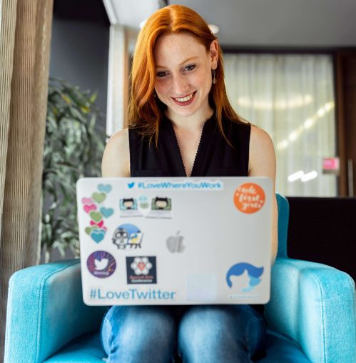 ginger-girl-with-laptop Girl with Laptop Checking Updates